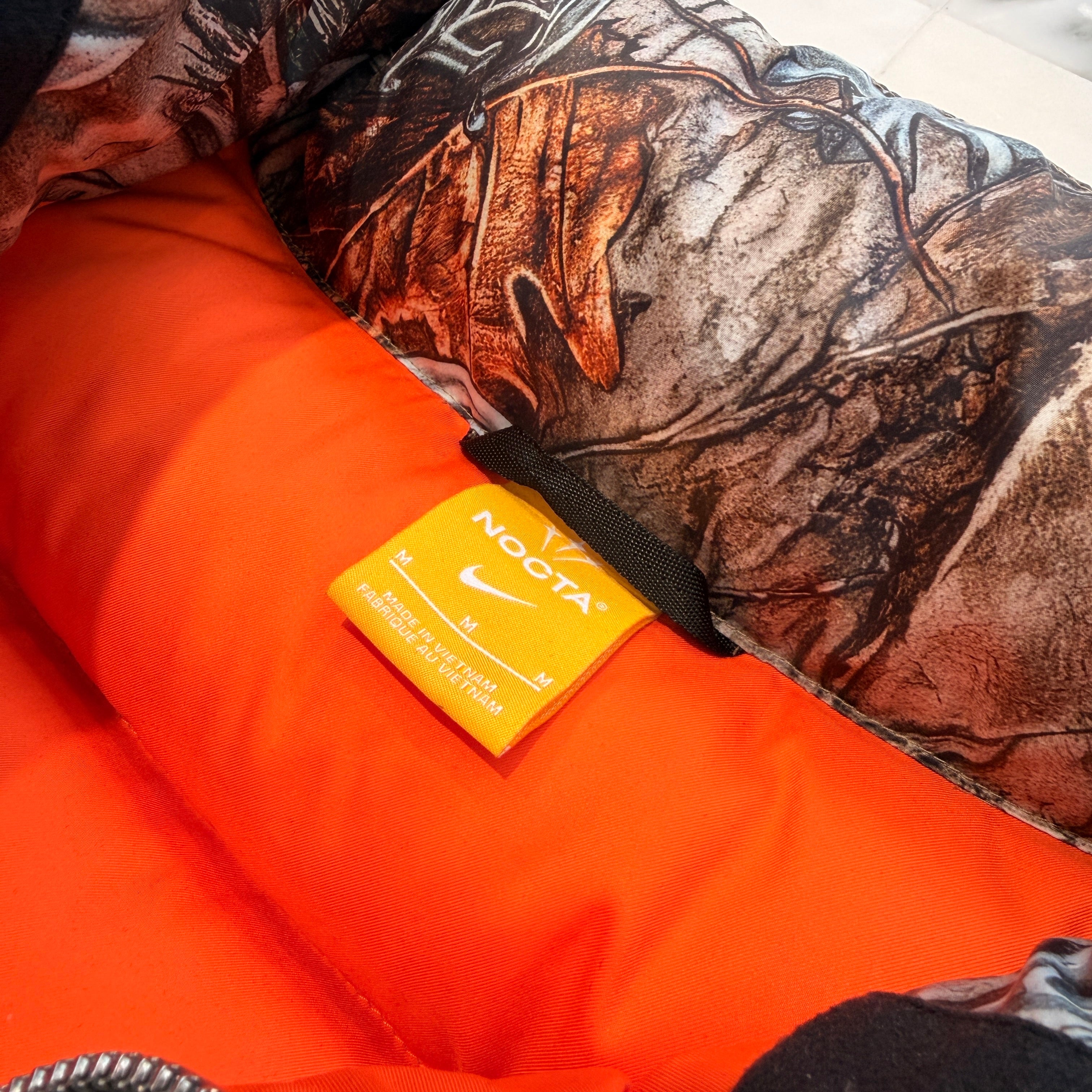 CHROME HEARTS × NIKE × Drake NOCTA 2026SS 3 Cemetery Cross Leather Patch Camo Down Jacket Size M クロムハーツ×ナイキ×ドレイク ノクタ 3 セメタリークロス レザーパッチ カモ ダウンジャケット サイズM