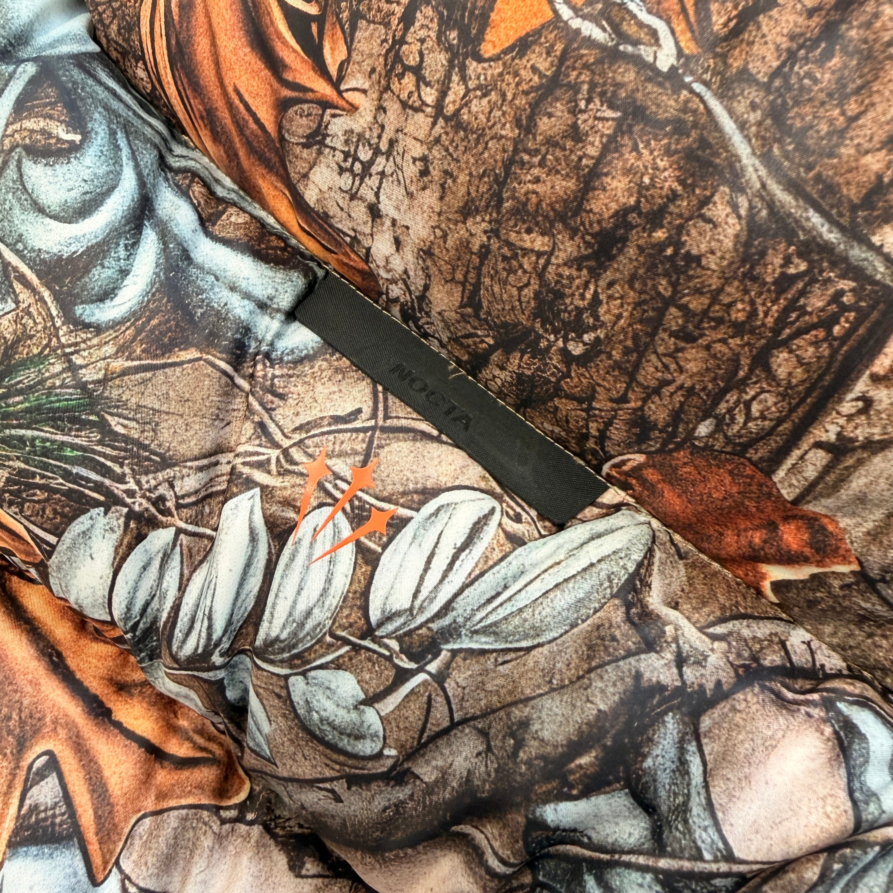 CHROME HEARTS × NIKE × Drake NOCTA 2026SS 3 Cemetery Cross Leather Patch Camo Down Jacket Size M クロムハーツ×ナイキ×ドレイク ノクタ 3 セメタリークロス レザーパッチ カモ ダウンジャケット サイズM