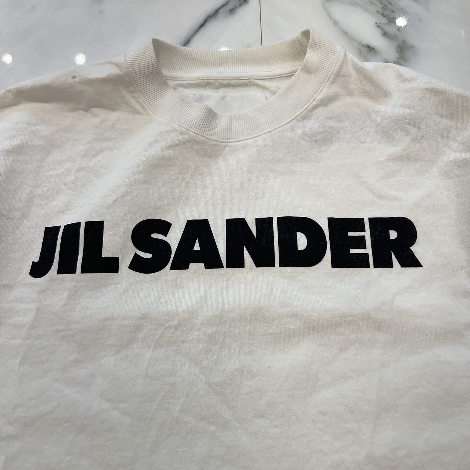JIL SANDER 2023SS Bottle Neck Logo Print Oversized Tee JSPS707050 WS248708 Size S ジルサンダー ボトルネックロゴプリントオーバーサイズTシャツ サイズS